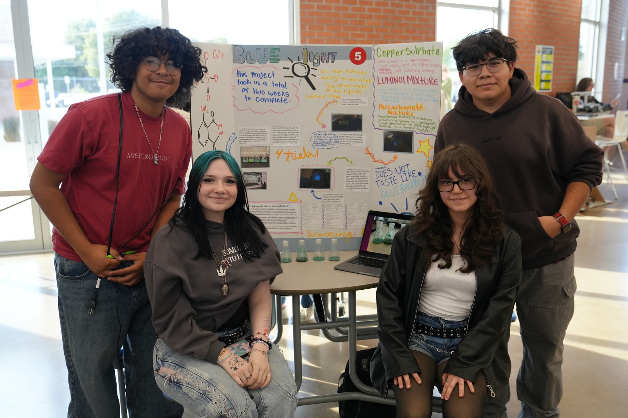 Highland Prep West students presenting college-level work at the science fair